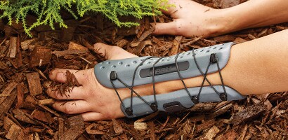Gardening while wearing brace.
